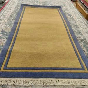 Käsinsolmittu villamatto, Laama