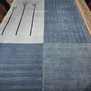 Käsinsolmittu Dolpa villamatto, sininen